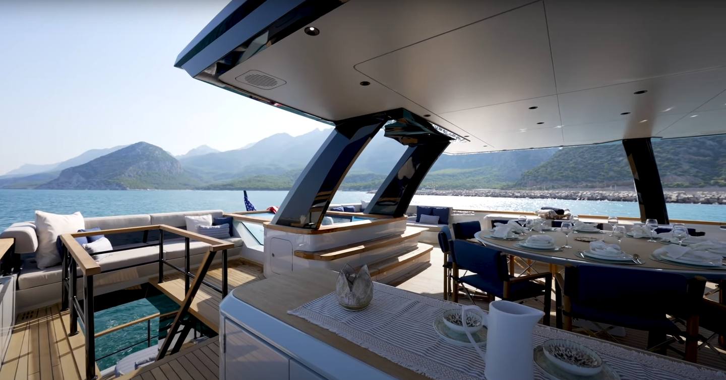 Lazzara LPC 300 Power Catamaran sundeck with shaded alfresco dining and jacuzzi 