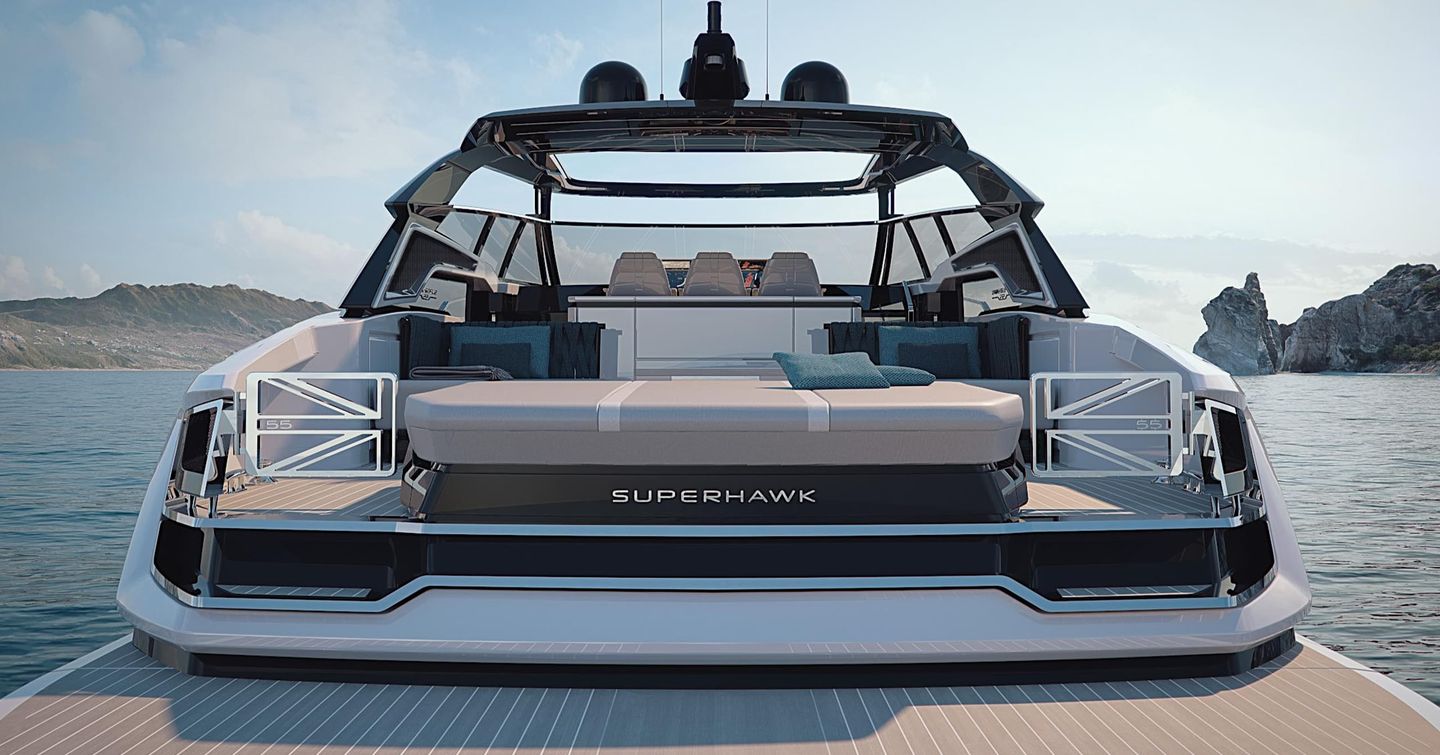 Aft view of Sunseeker Superhawk 55, swim platform visible with exterior lounge area in background, surrounded by sea.