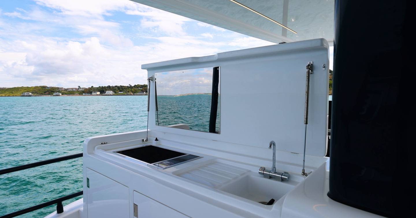 Sirena 48 flybridge wet bar with grill and sink