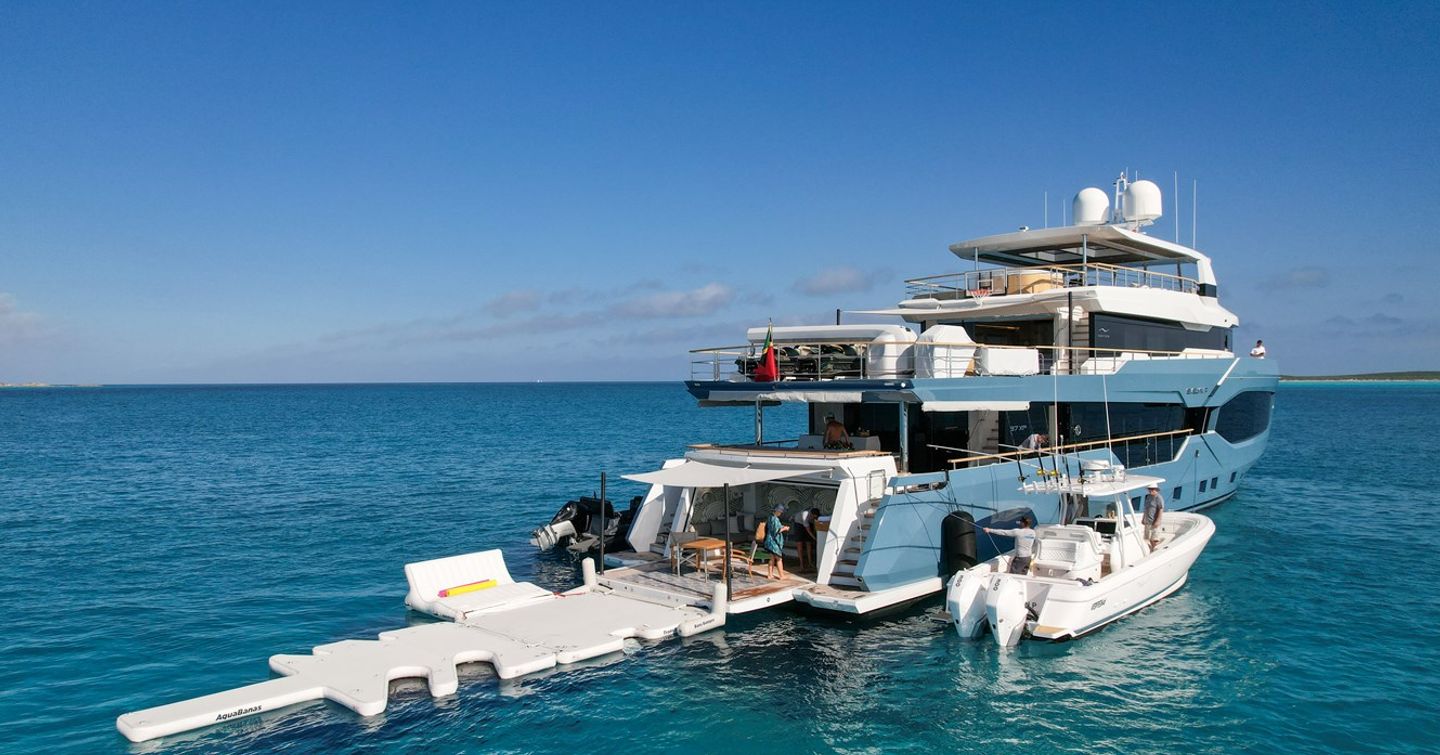 Superyacht Evelyn P at anchor with extended beach club