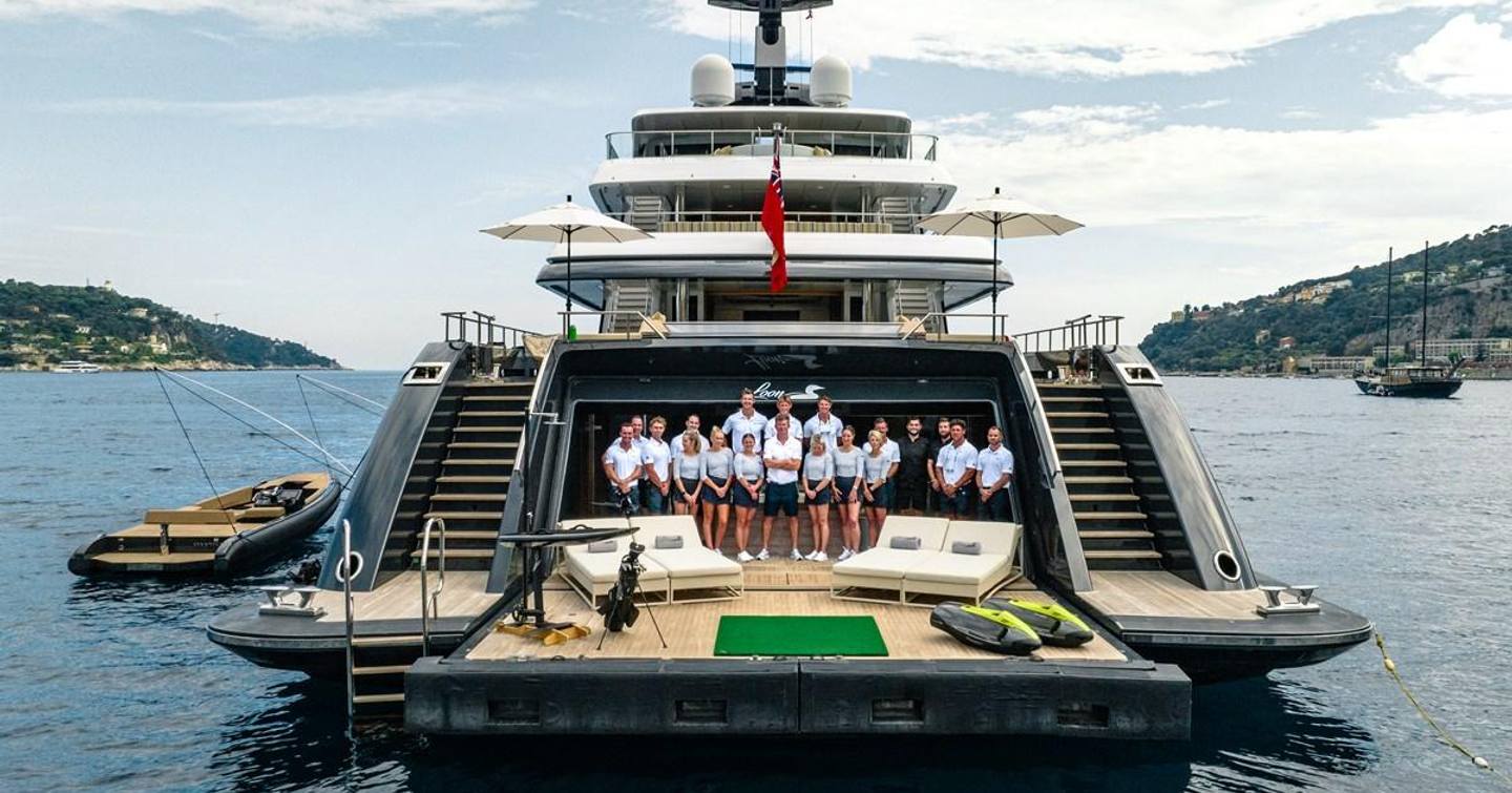 Motor yacht Loon with crew dressed in uniform and a selection of her toys 