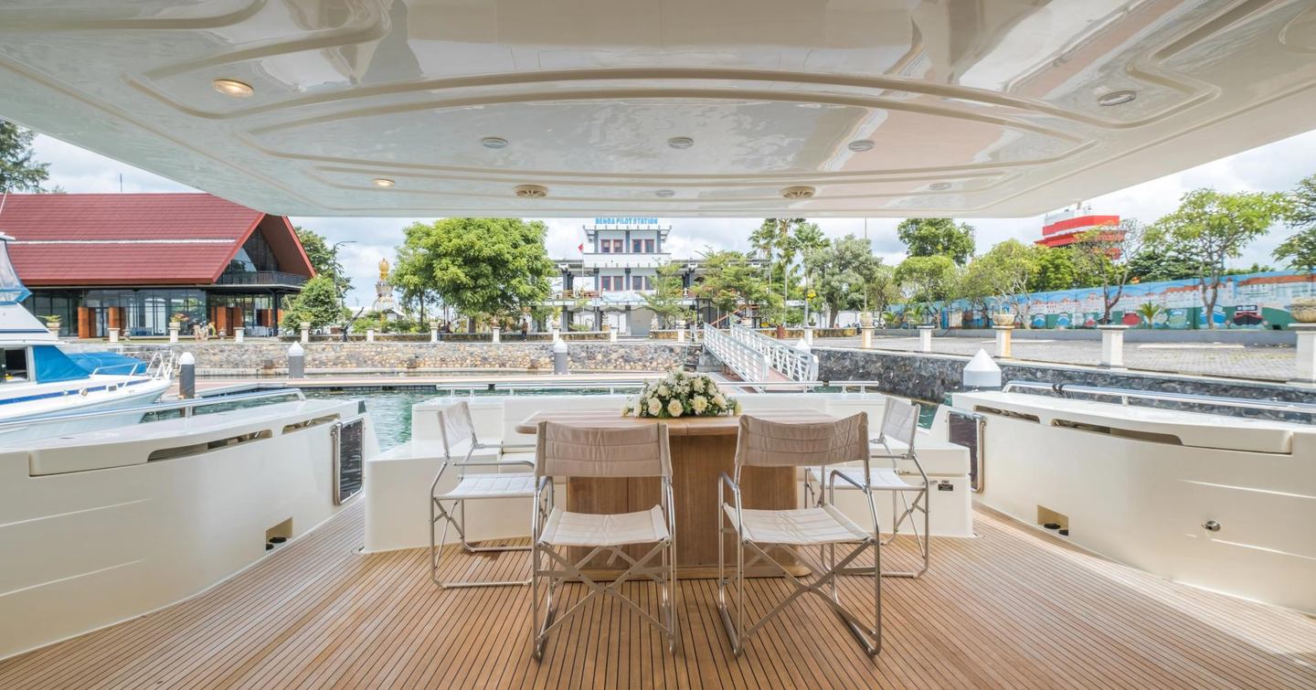 Ferretti motor yacht Samkara aft deck dining area 