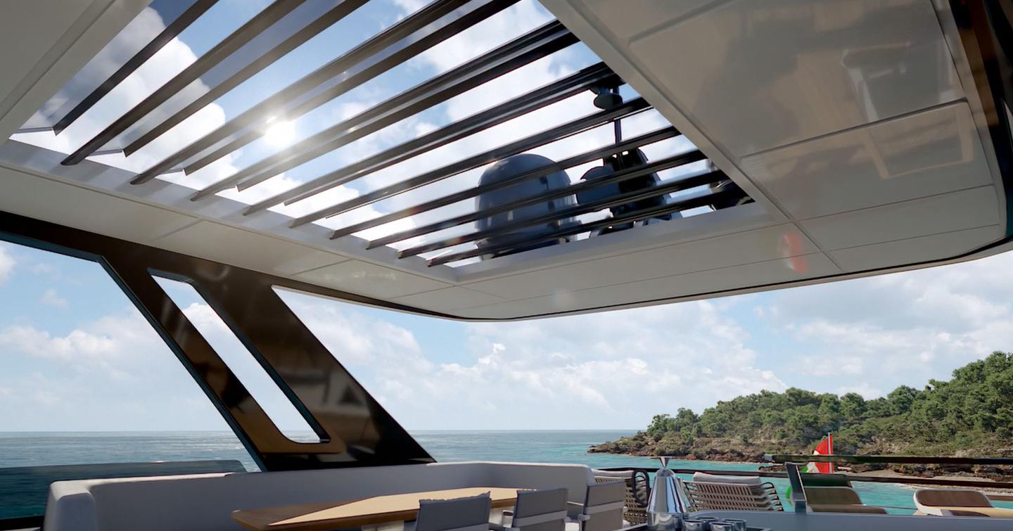 Cokpit on motor yacht Ferretti 800 with glass parapet and views over the stern, sheltering a dining area 