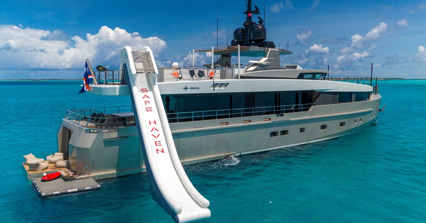 Superyacht at anchor with inflatable slide 