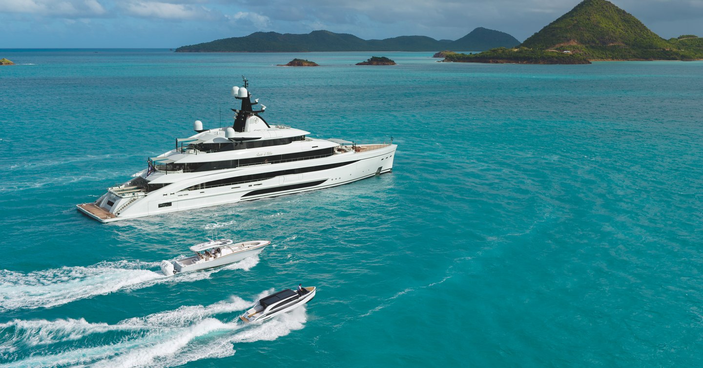 CRN Superyacht Amor à Vida under way with dual tenders adjacent 