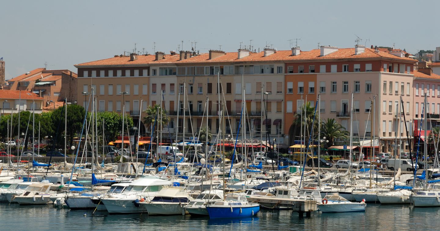 A busy marina on a sunny day 