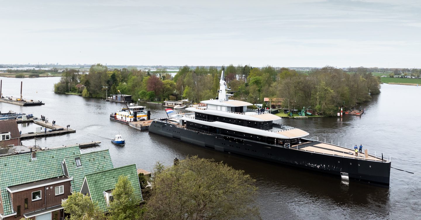 Feadship Superyacht Thalassa (Project 826) at launch with tugboat following