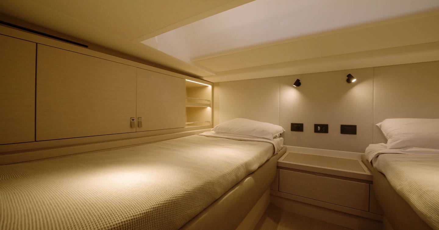 Pardo-43-Review-aft-twin-cabin-berths-and-storage-interior