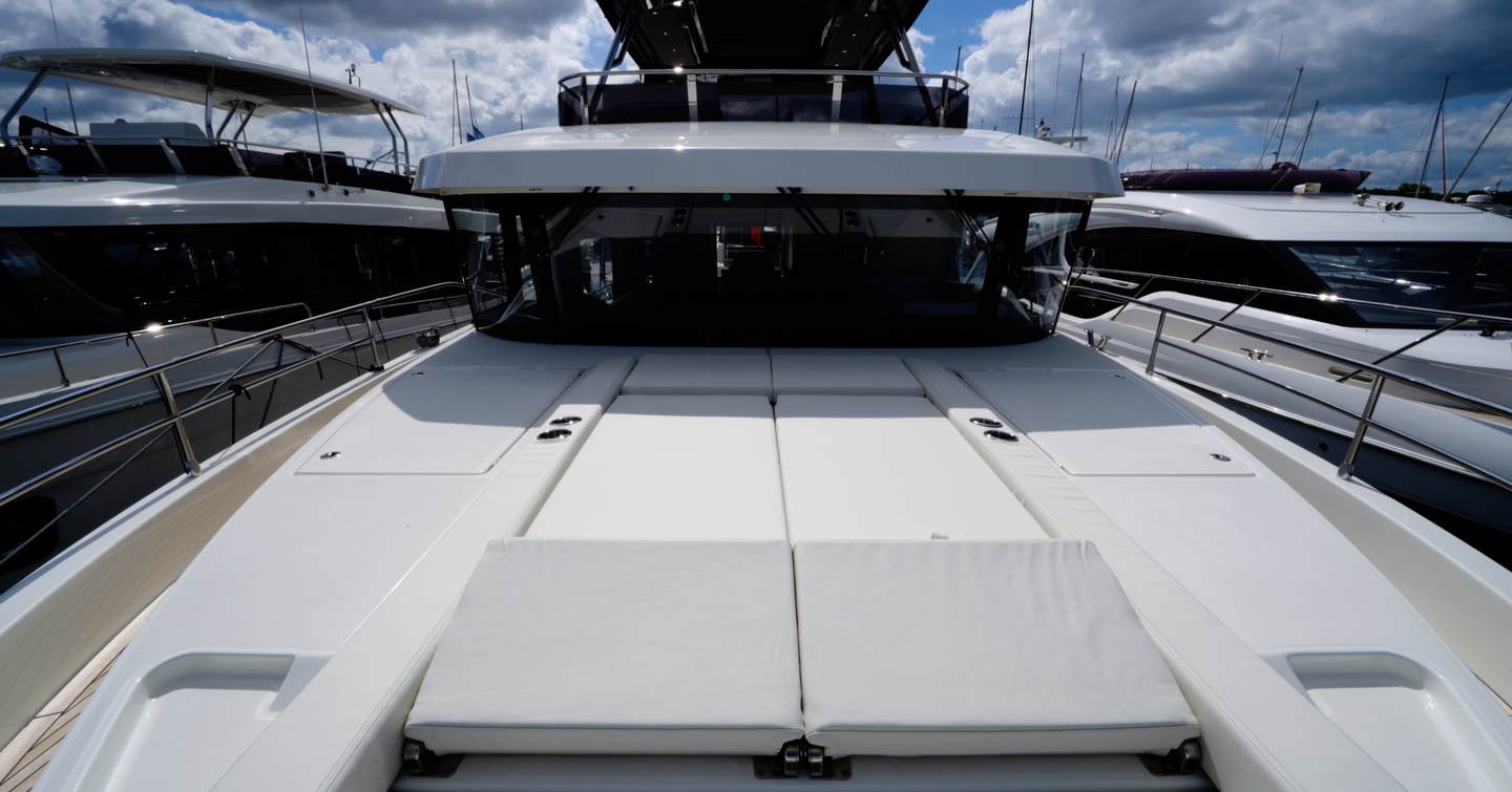 Beneteau Grand Trawler 63 foredeck sunpad with wide walkways and secure side deck access