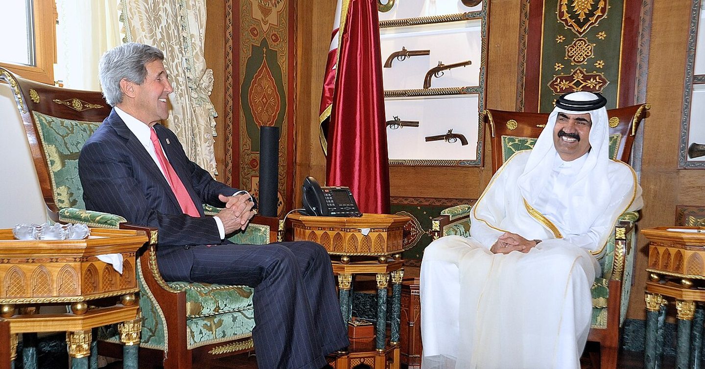 John Kerry meets with the former Emir in 2014