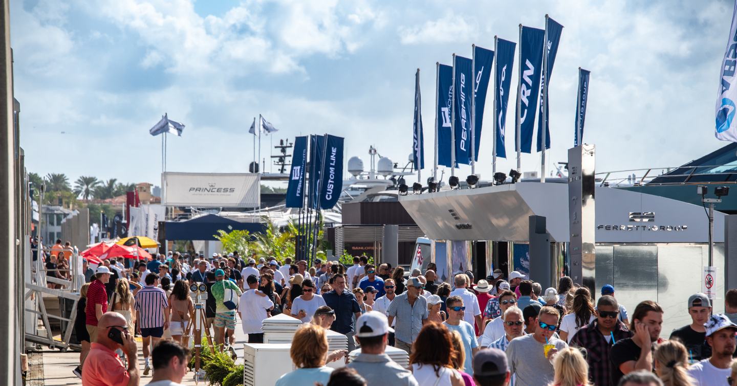 Visitors walking around at FLIBS 2024.