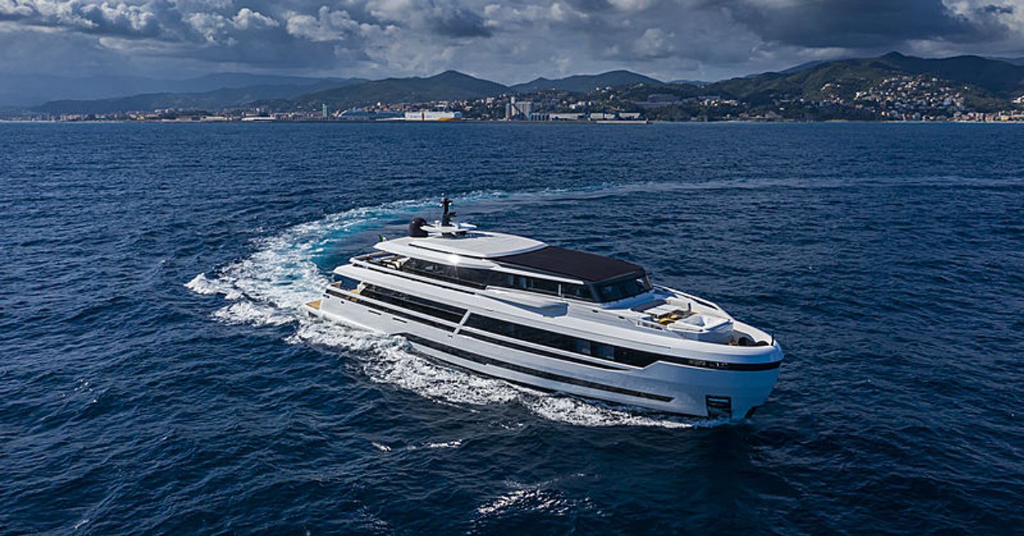  Superyacht L.A.U.L running with mountains behind her