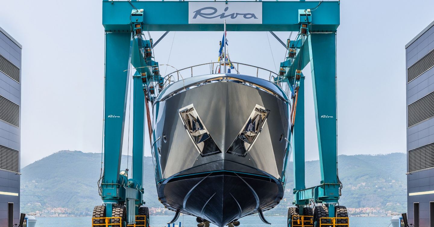 First Riva 112 DolceVita Super motor yacht being lowered in water at launch