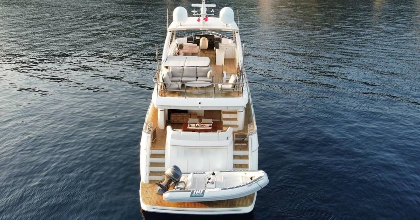 Princess motor yacht Omnia Natura at anchor stern view 