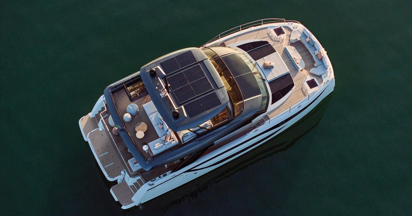 Prestige M8 Evo motor yacht at anchor aerial view 
