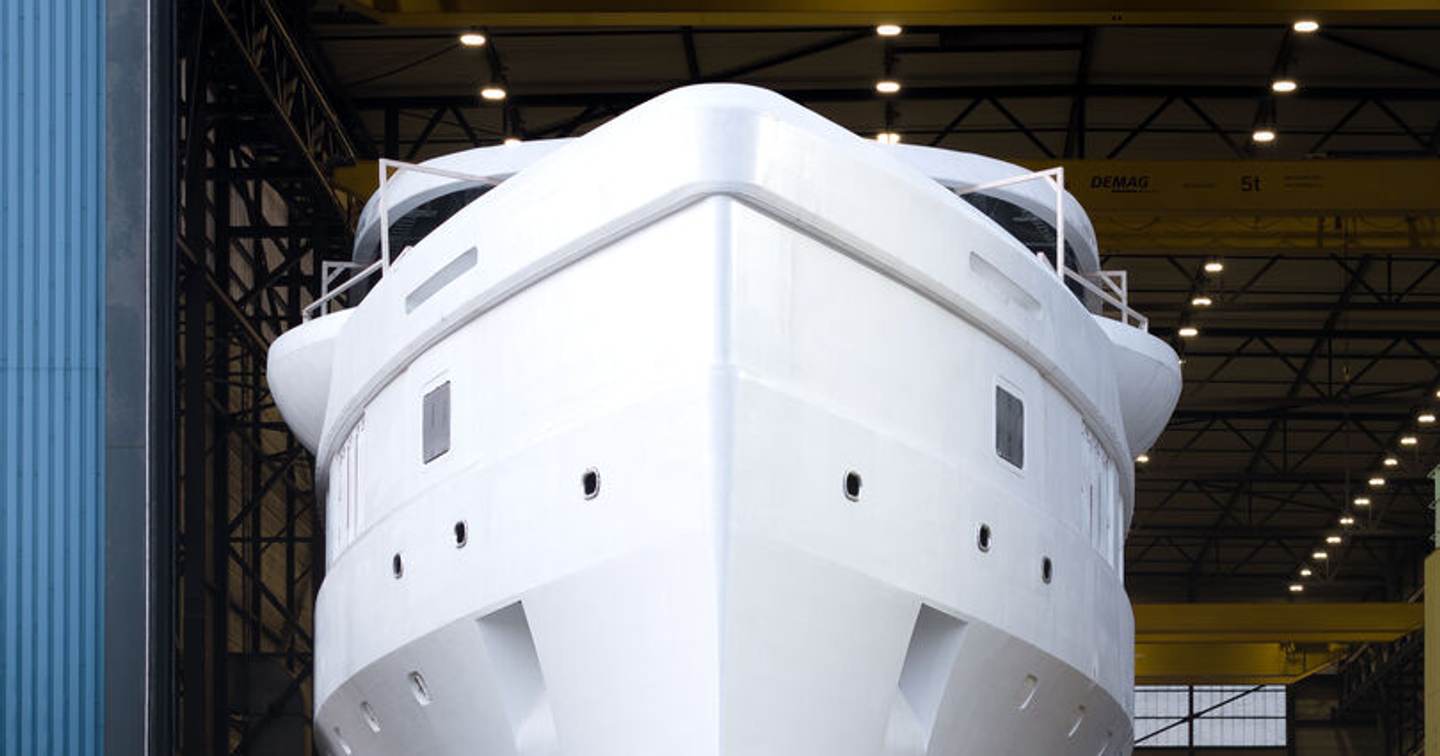 Front shot of superyacht Feadship 719 leaving shipyard pre-outftting