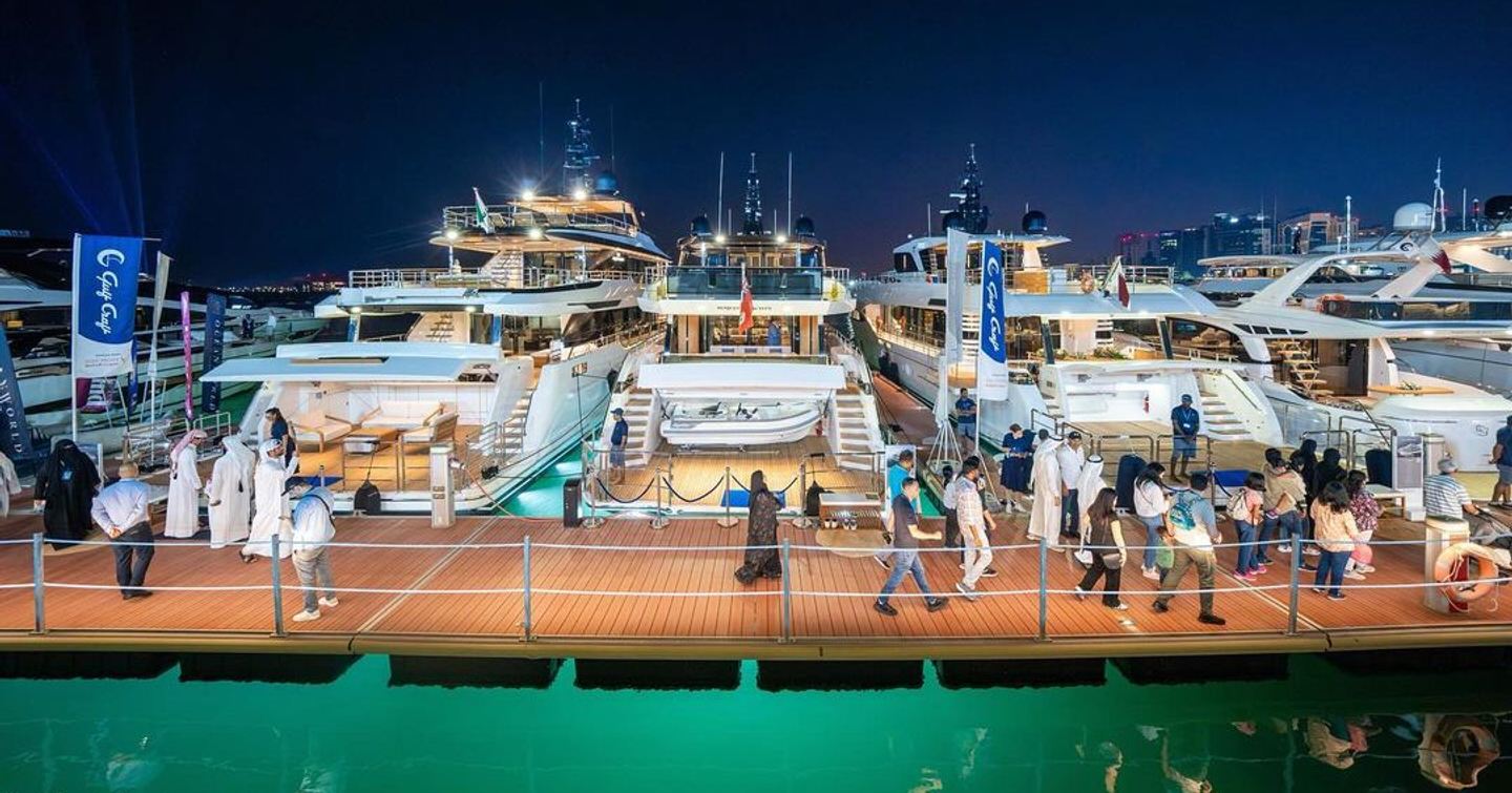 Aft view of superyachts berthed in Old Doha Port