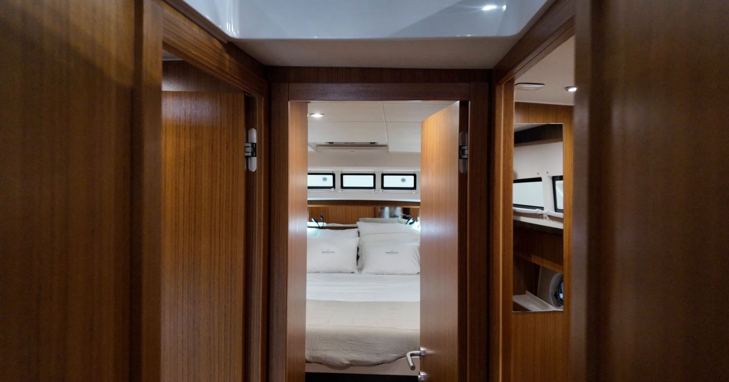 Greenline 42 owner’s cabin forward through lobby with double berth and hull windows