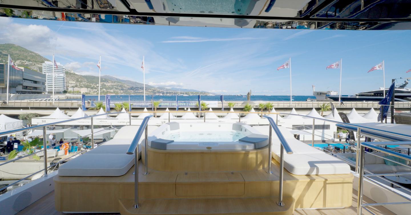 Custom Line Navetta 38 sundeck with hot tub, raised seating and views over the stern