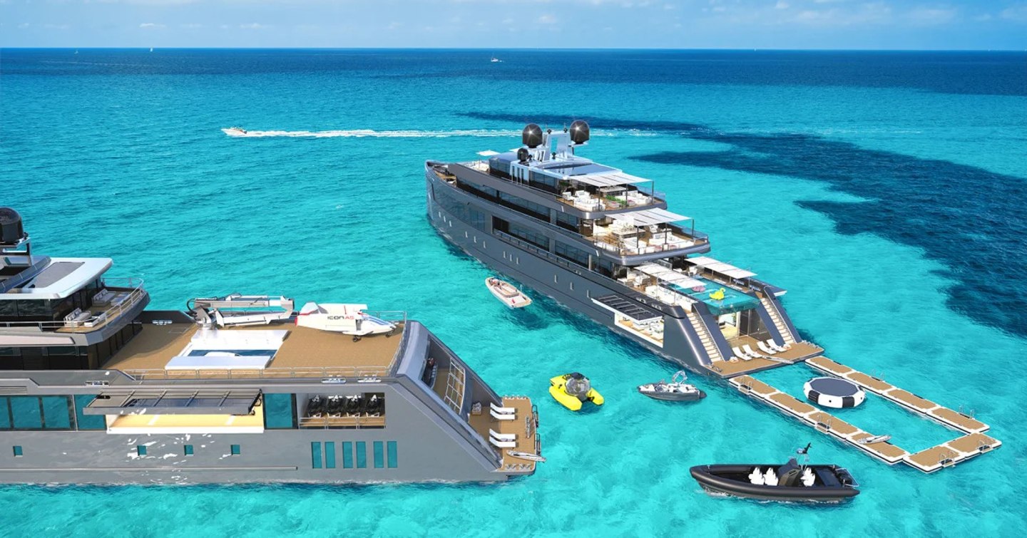 Twins concept on water with tenders and toys between the two yachts