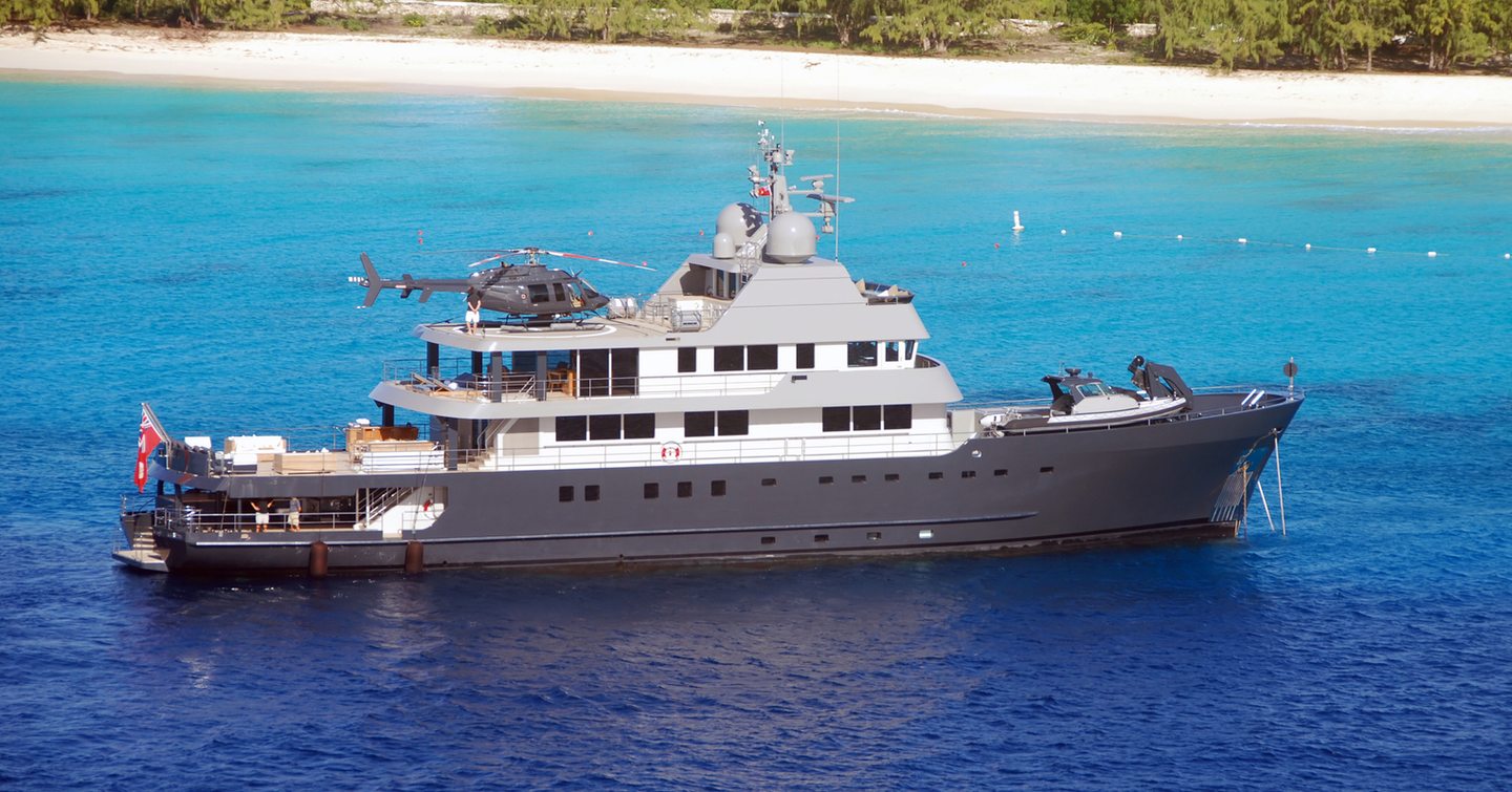 A large explorer yacht at anchor side view 