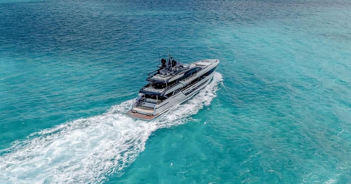 Riva motor yacht Janus Navem underway stern view 