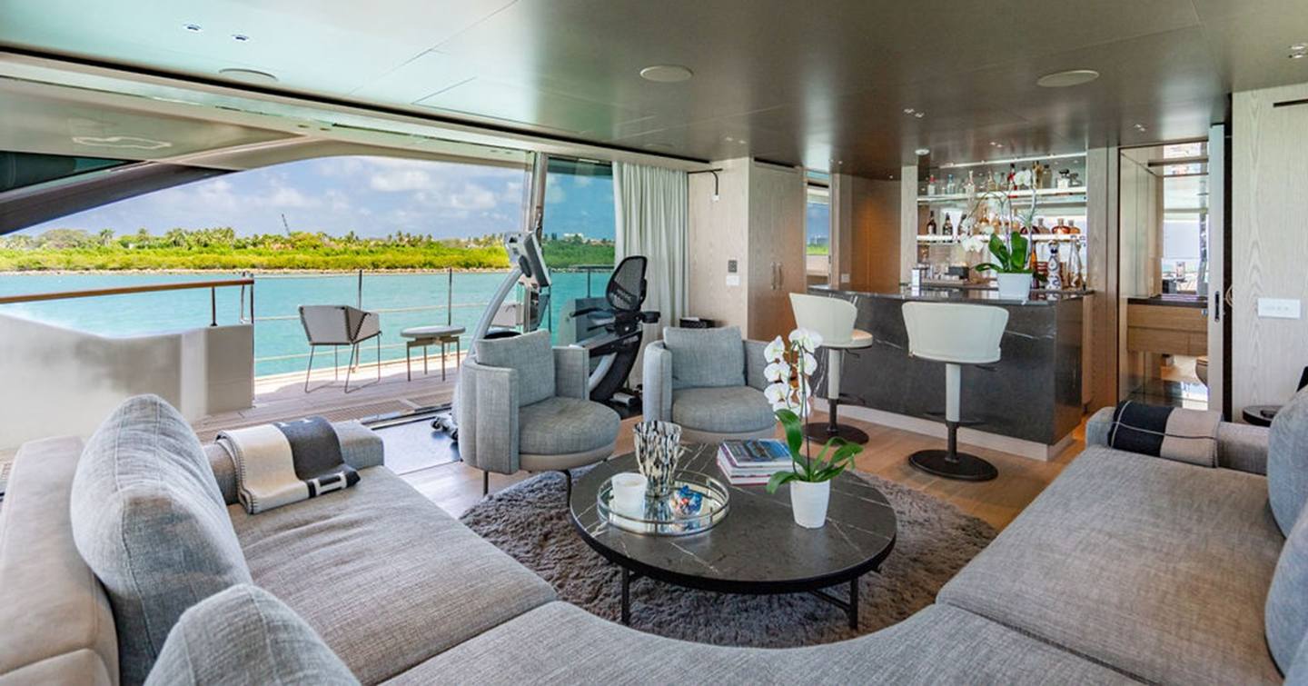  Superyacht The Wolf skylounge with U-shaped seating and bar area