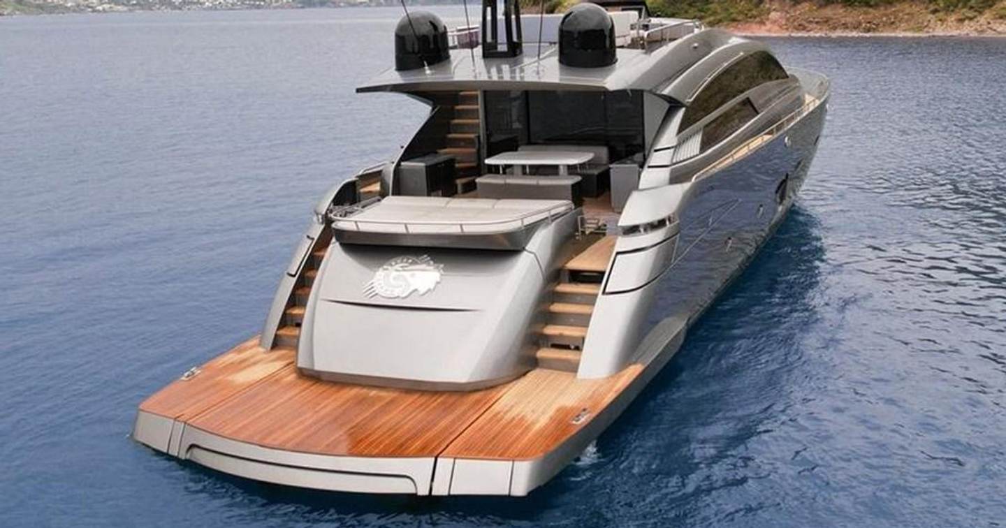  Pershing motor yacht Honey Badger at anchor stern view 