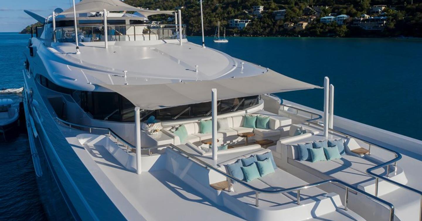 Superyacht Scott Free foredeck with sunpads and shaded seating