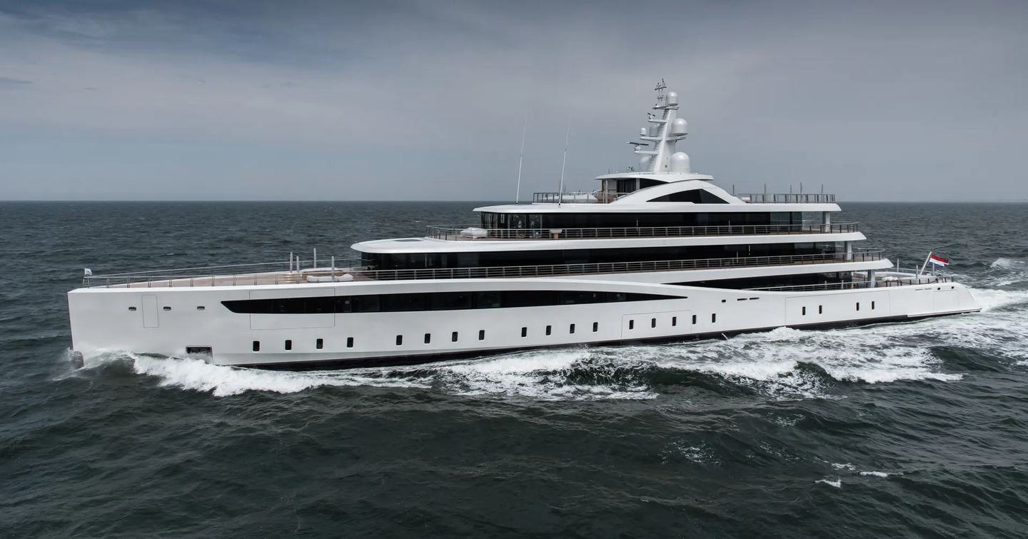 Superyacht VIVA underway, surrounded by sea.