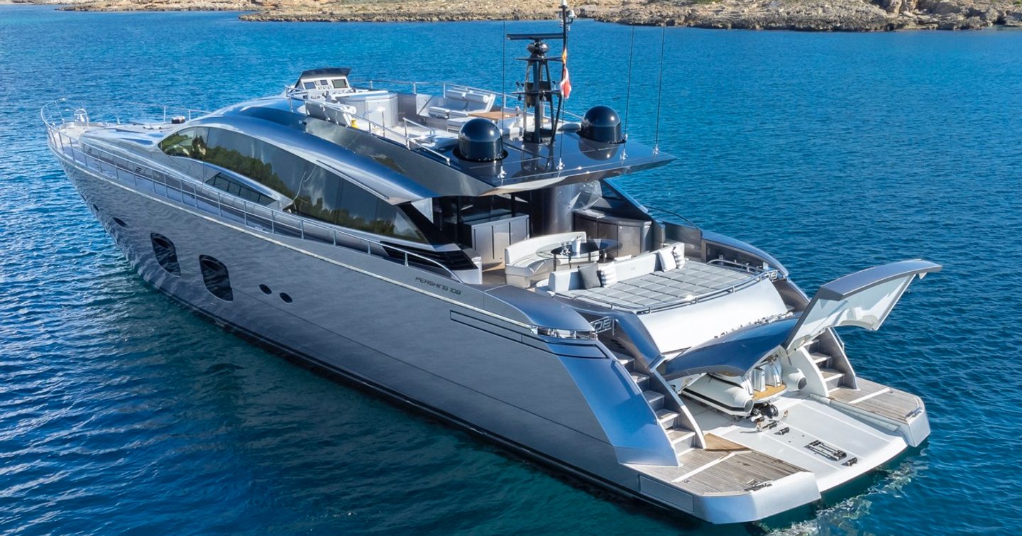 Pershing motor yacht Aldebaran III at anchor stern view 