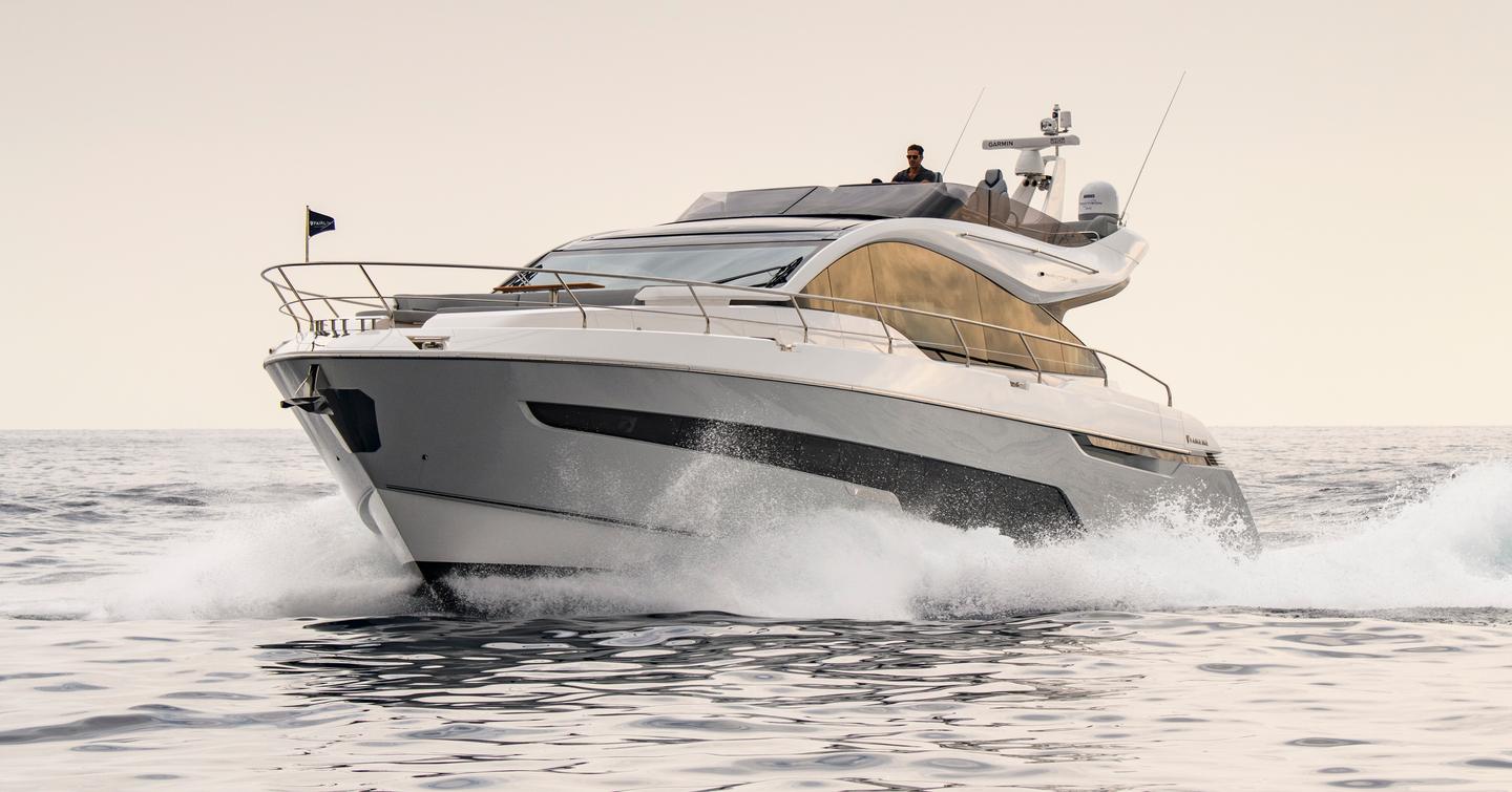 Fairline Phantom 65 underway, facing foreground and surrounded by sea.