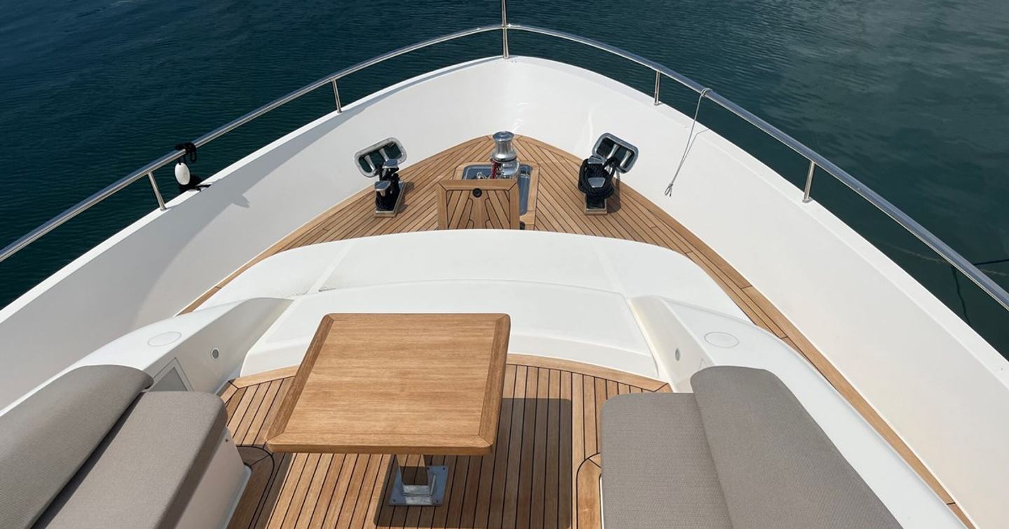 Motor yacht Alhambra I foredeck with U-shaped grey sunpads 