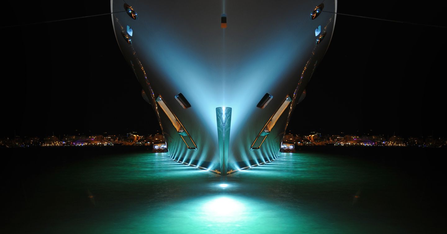 superyacht bow water level at night