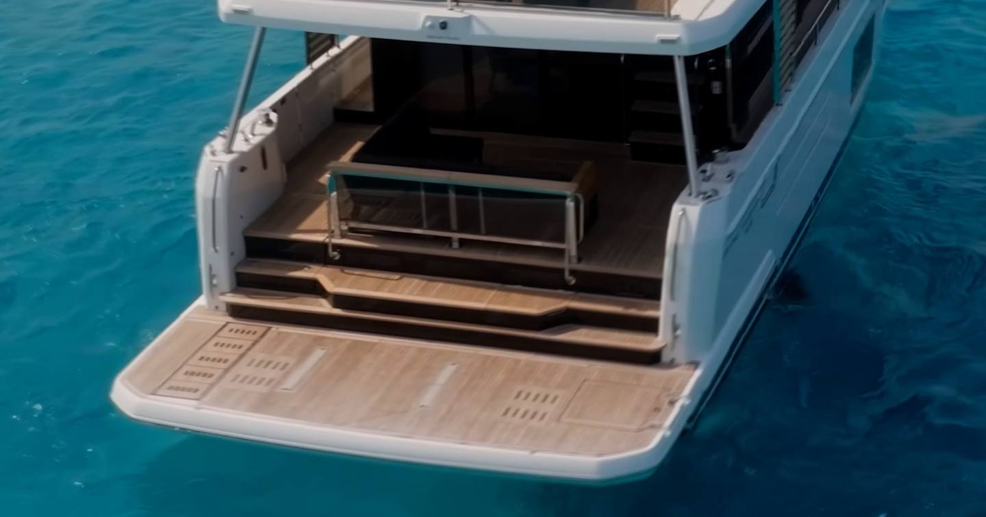 Beneteau Grand Trawler 63 hydraulic swim platform with stepped access to the aft cockpit