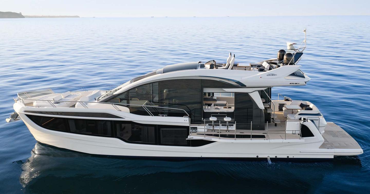 Galeon 570 Sky yacht at anchor side view 