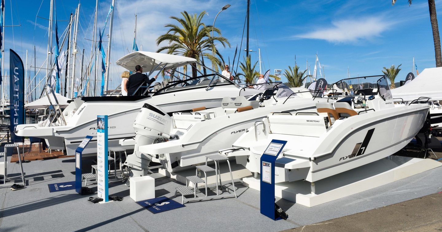 Overview of a lineup of motor yachts for sale on display at the Palma International Boat Show