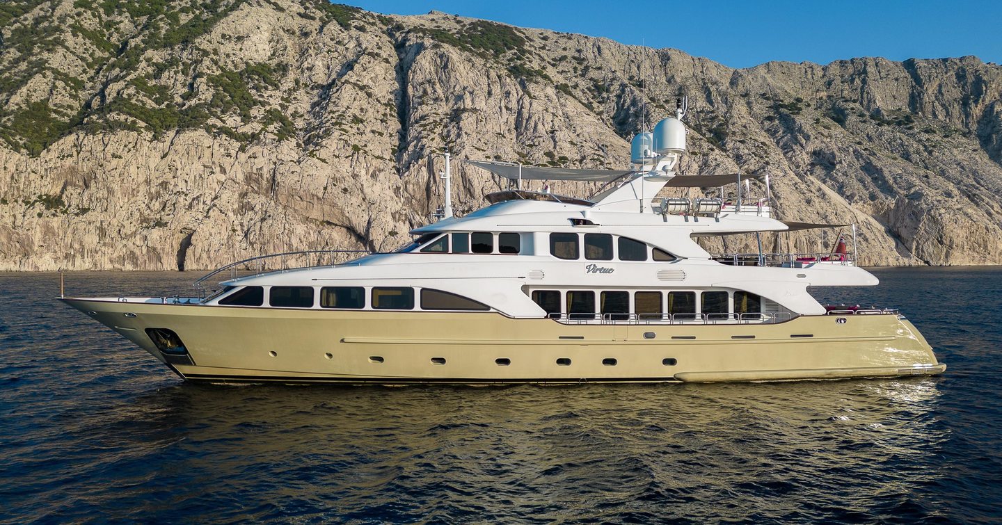 Benetti motor yacht Virtue at anchor side view 