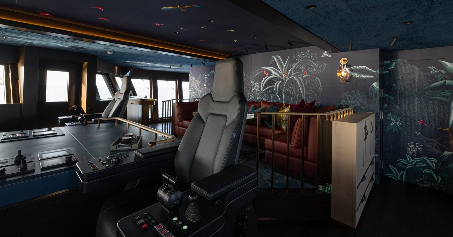 The bridge aboard Damen Yachting's PINK SHADOW features jungle-inspired wallpaper