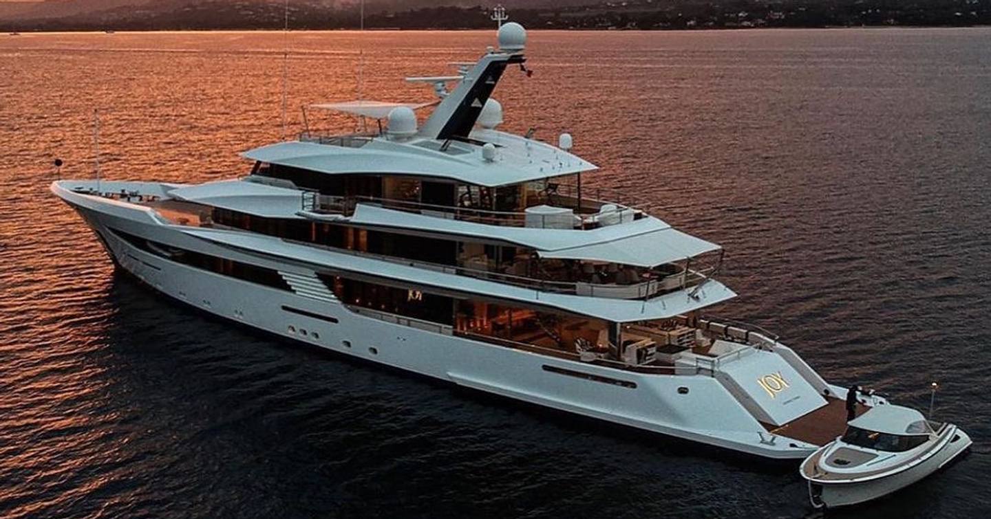 Feadship superyacht Joy at anchor at sunset 