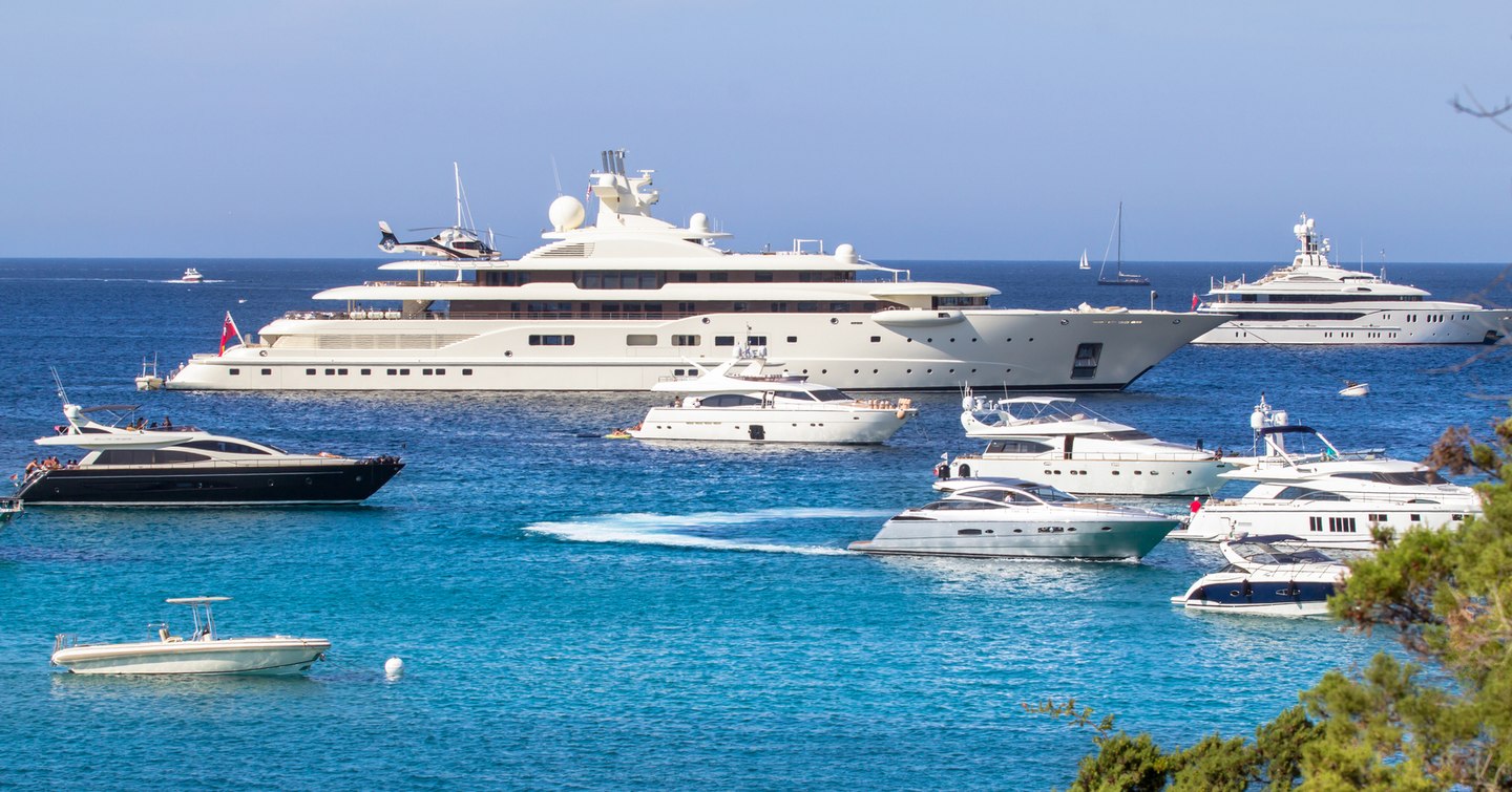 Yachts underway at a marina 