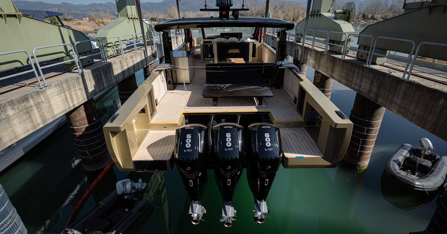 Forte 47 Gran Turismo dayboat aft shot with outboard engines during launch ceremony