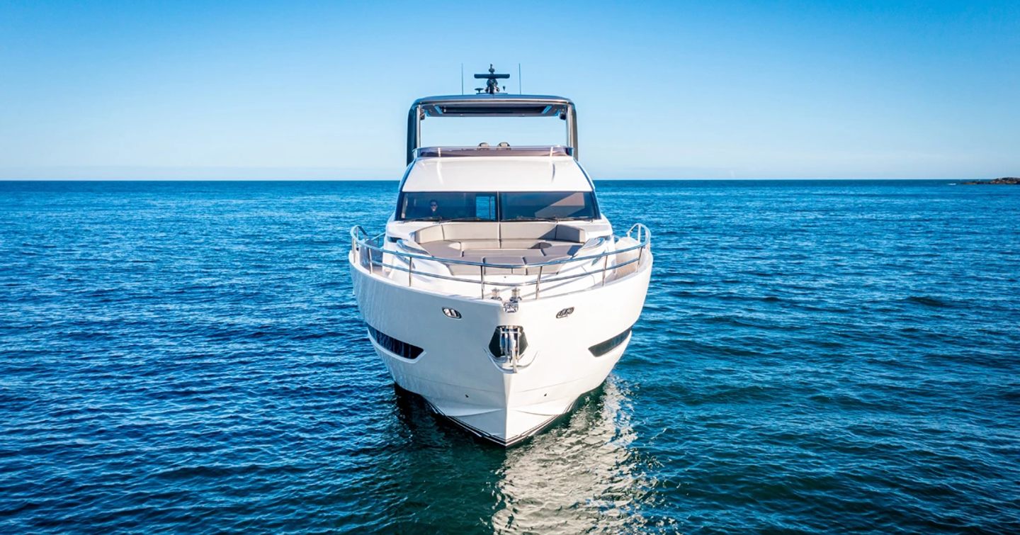 Frontal view of Princess Y85, looking directly at the bow. Surrounded by sea.