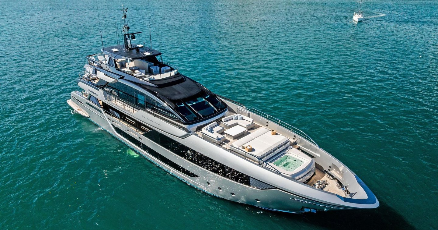 Riva yacht Tenacious at anchor side view 