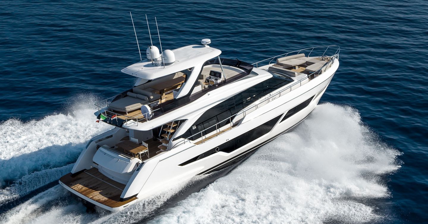 Ferretti 670 motor yacht underway stern view 