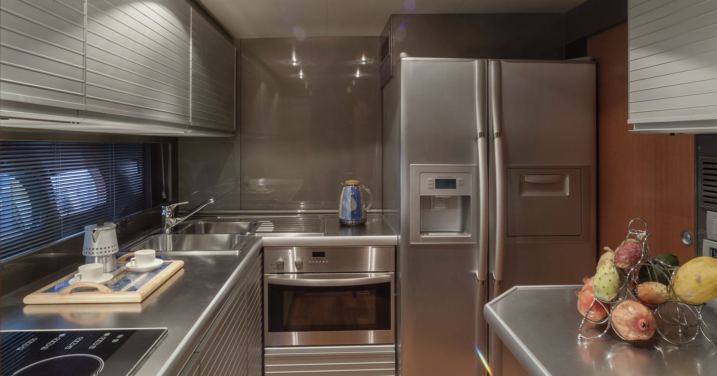 Galley on yacht, with stainless steel units