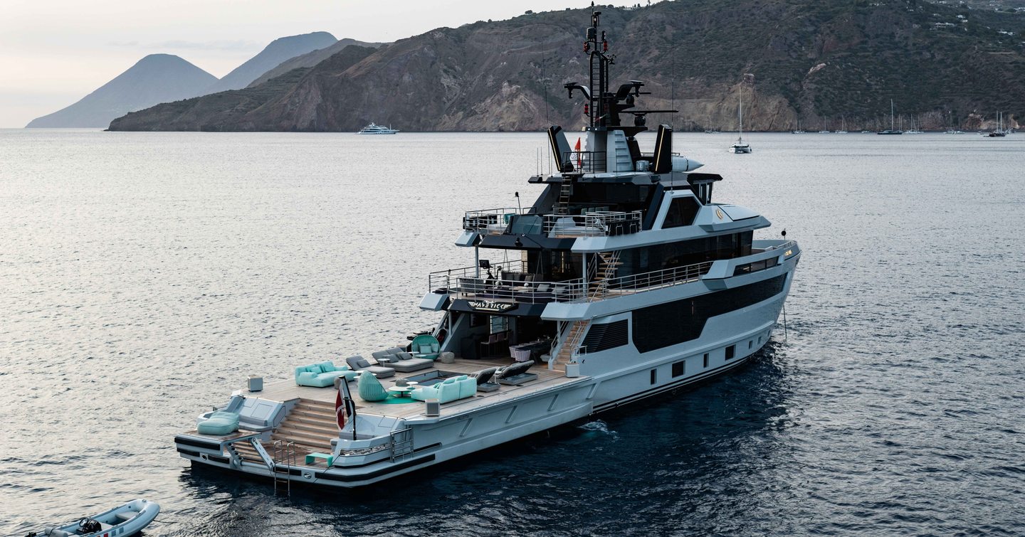 Aft angle view of superyacht MAVERICK at anchor