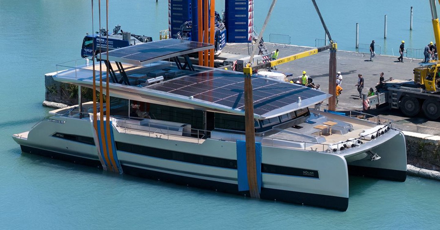 Silent Yachts SY80 catamaran at launch being lowered into water