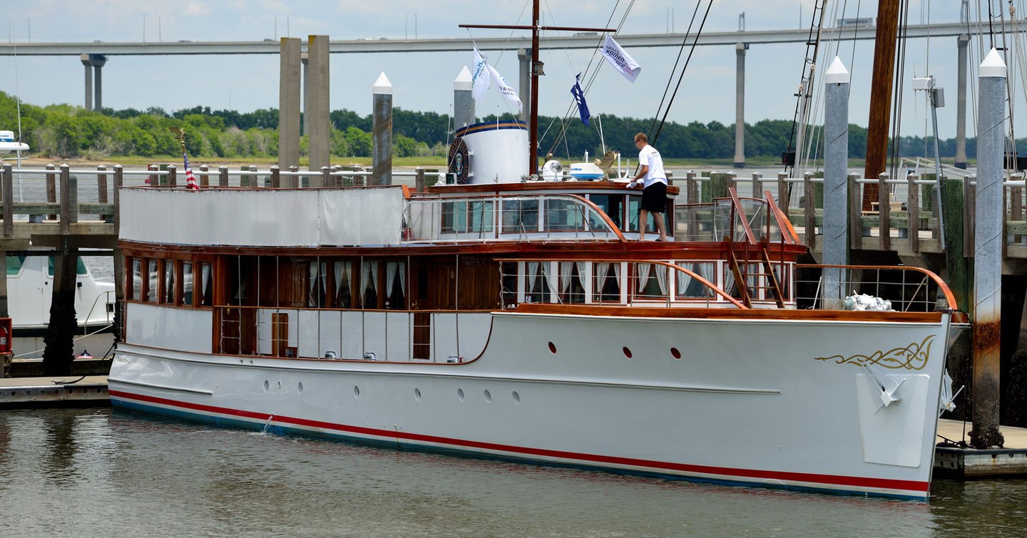 Yacht named Honey Fitz berthed at a dock