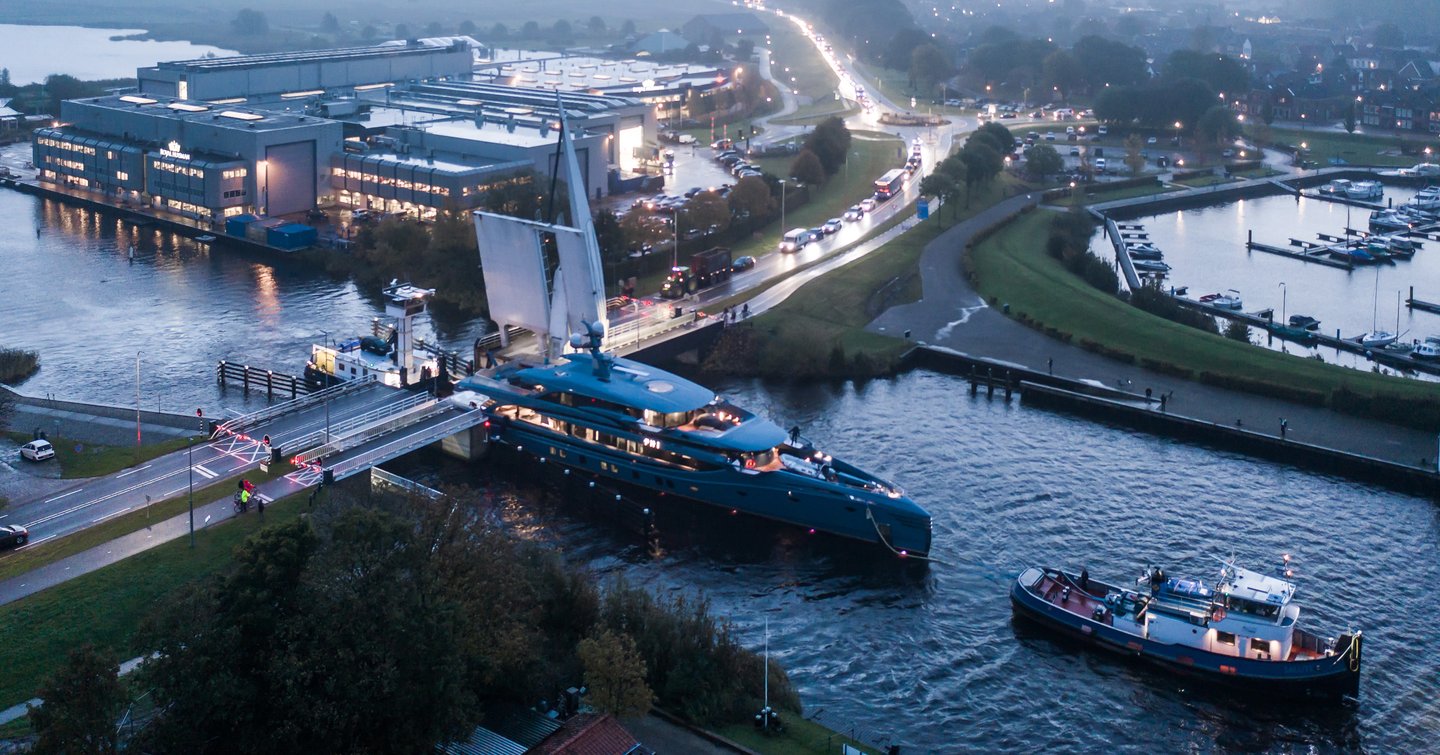 Superyacht PHI on canal in Netherlands